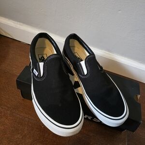 Vans Unisex Black and White Slip-On Sneakers